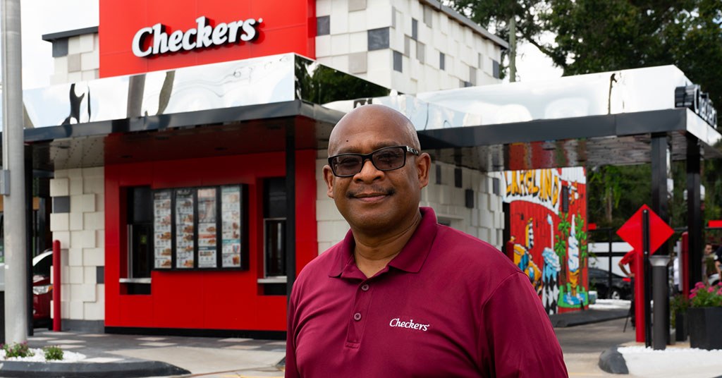 Sedrick Turner outside one of his Checkers locations